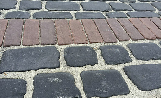 Polymeric sand between pavers